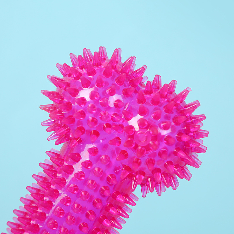 Interactive Squeaky Plush Dog Toy - Hundekau-Spielzeug Knochenförmiger Stachelball TPR-Kunststoff Bissfester Hüpfball